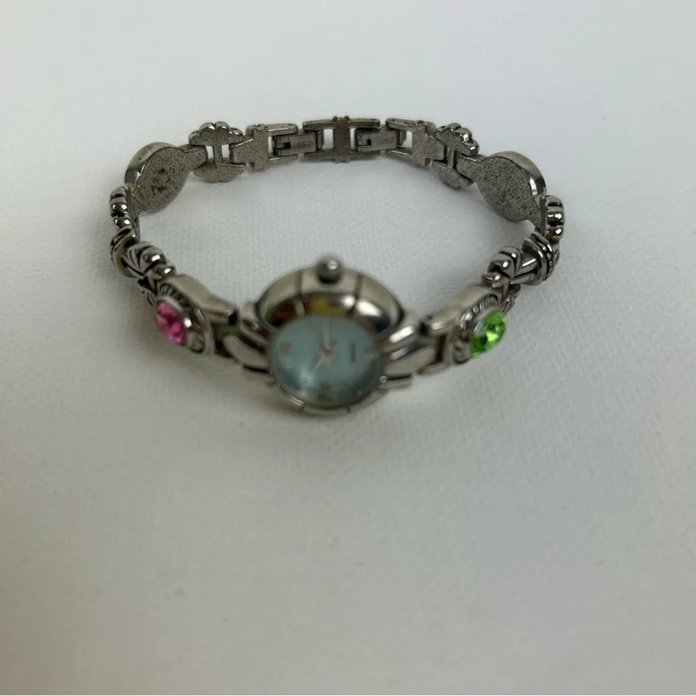 Elegant Silver Tone Quartz watch with Pink, Green, Gold and Blue Accents